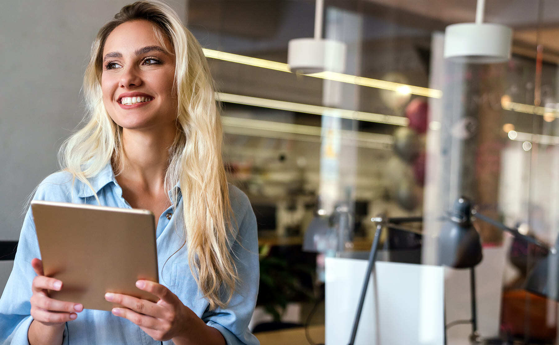 Woman working holding clipboard